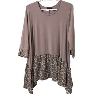 Vision boutique style tunic top with asymmetrical leopard hem size M